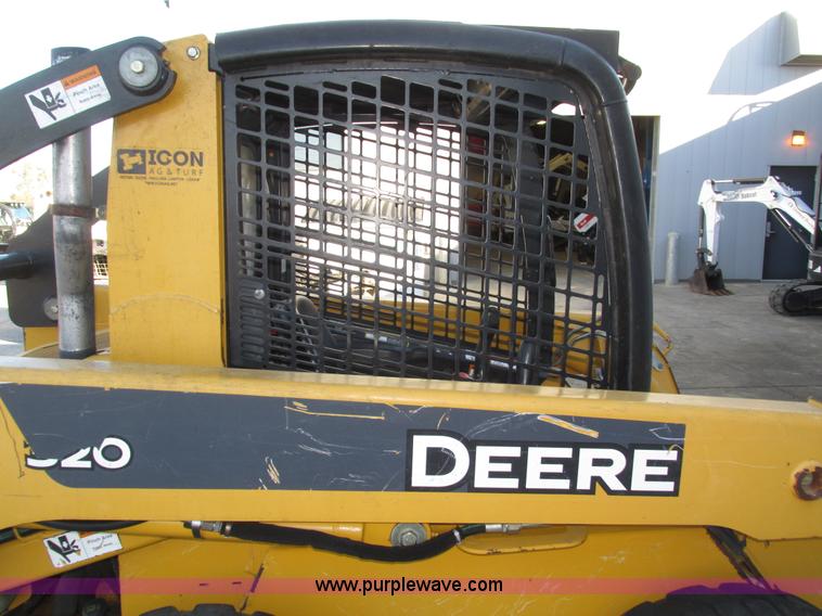 image for item H1064 2009 John Deere 320 skid steer