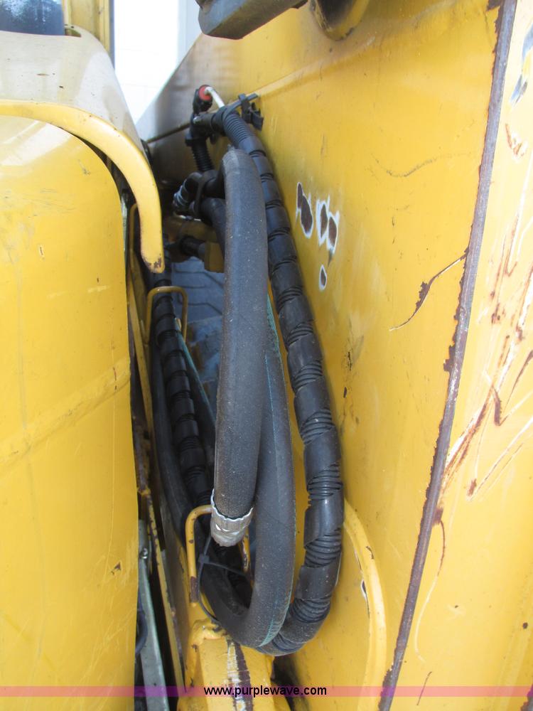 image for item H1064 2009 John Deere 320 skid steer