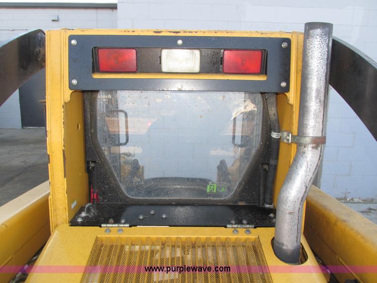 image for item H1064 2009 John Deere 320 skid steer