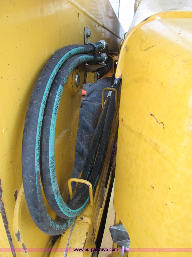 image for item H1064 2009 John Deere 320 skid steer