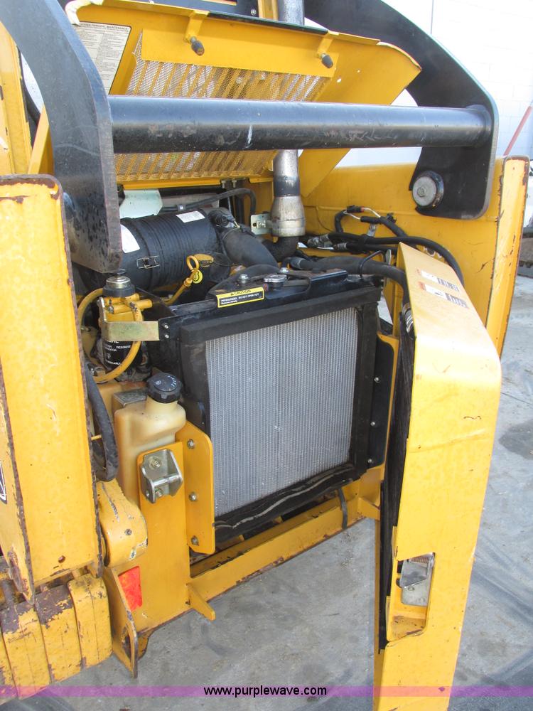 image for item H1064 2009 John Deere 320 skid steer