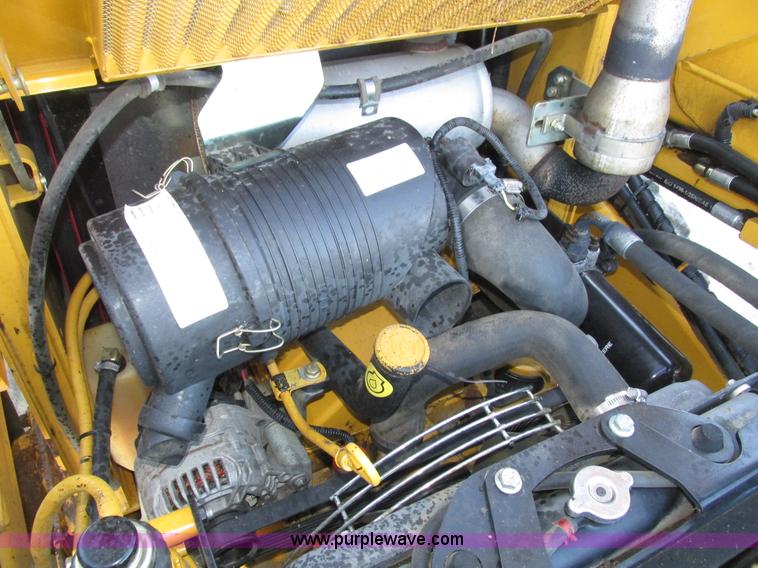 image for item H1064 2009 John Deere 320 skid steer