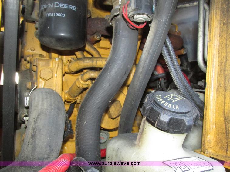 image for item H1064 2009 John Deere 320 skid steer