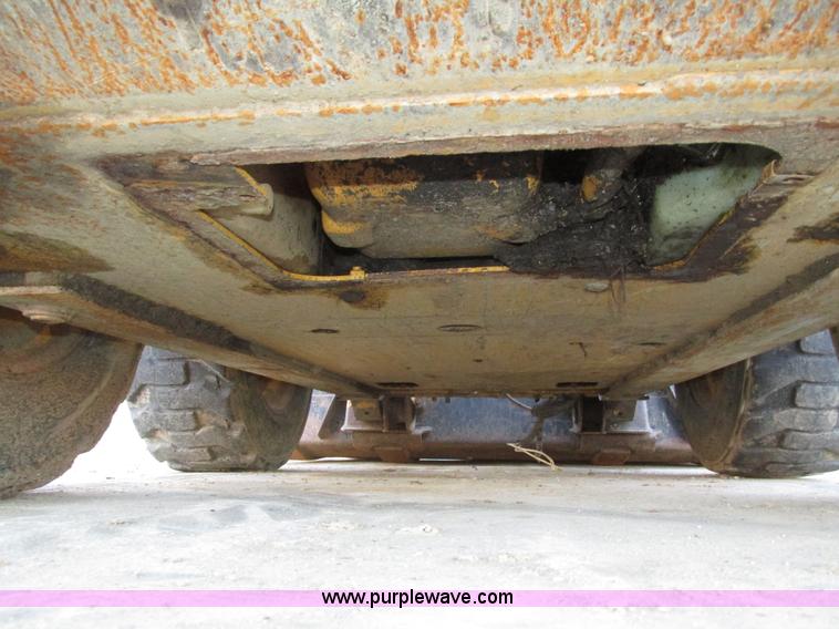 image for item H1064 2009 John Deere 320 skid steer