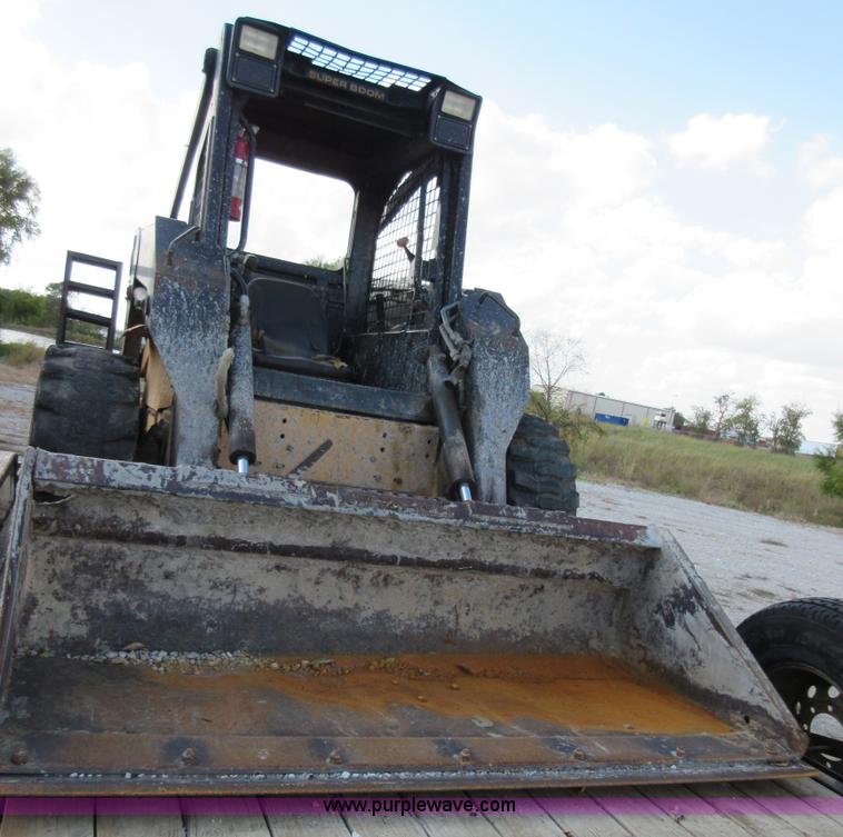 image for item I1894 1999 New Holland LX885 Super Boom skid steer