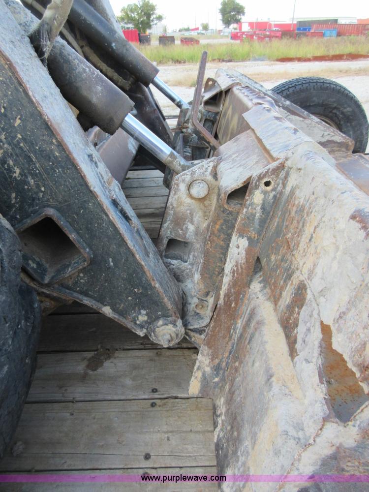 image for item I1894 1999 New Holland LX885 Super Boom skid steer