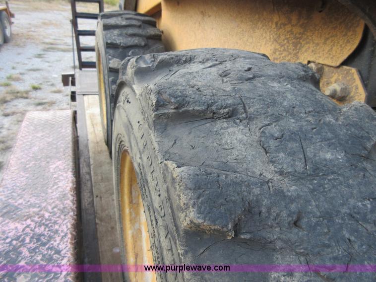 image for item I1894 1999 New Holland LX885 Super Boom skid steer