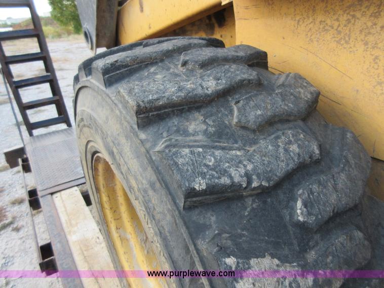 image for item I1894 1999 New Holland LX885 Super Boom skid steer