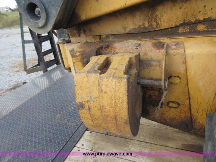 image for item I1894 1999 New Holland LX885 Super Boom skid steer