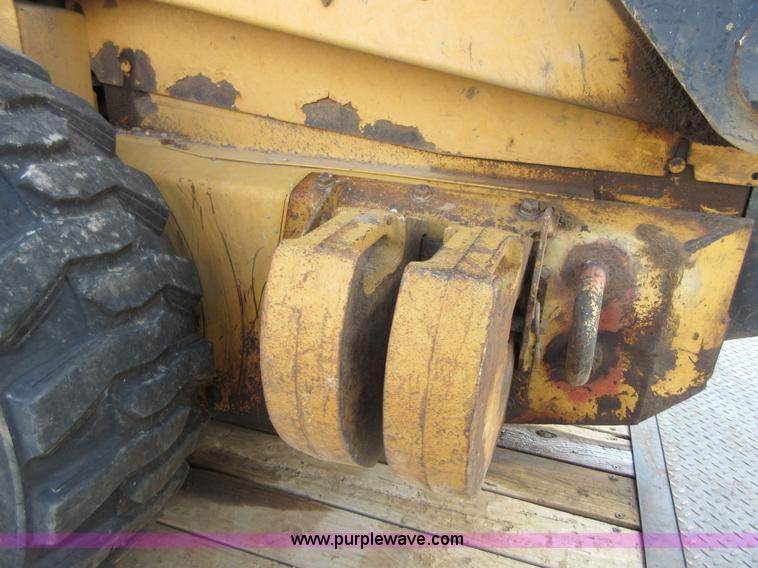 image for item I1894 1999 New Holland LX885 Super Boom skid steer