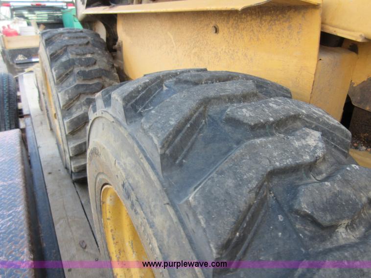 image for item I1894 1999 New Holland LX885 Super Boom skid steer