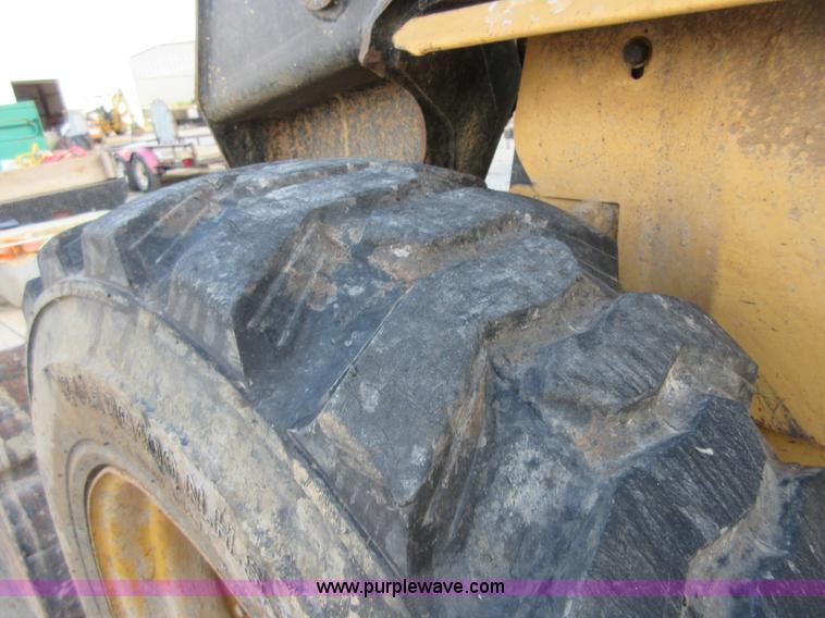 image for item I1894 1999 New Holland LX885 Super Boom skid steer