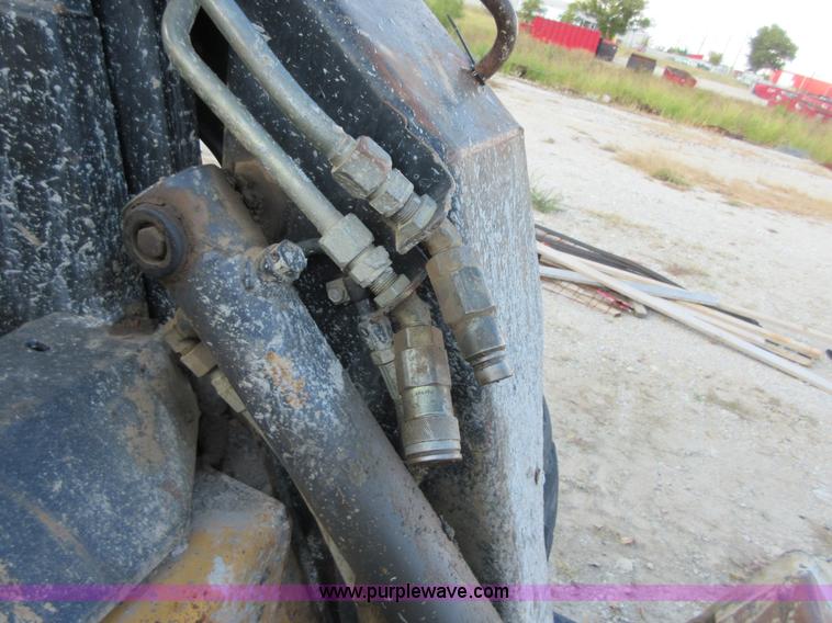 image for item I1894 1999 New Holland LX885 Super Boom skid steer