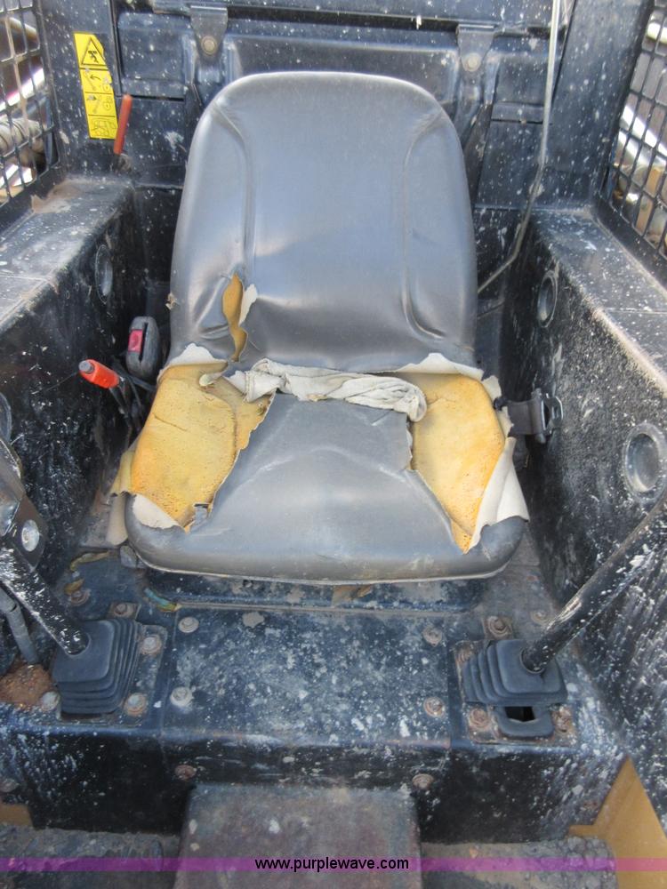 image for item I1894 1999 New Holland LX885 Super Boom skid steer