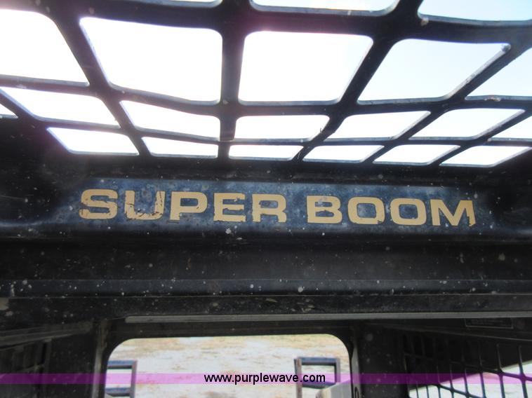 image for item I1894 1999 New Holland LX885 Super Boom skid steer