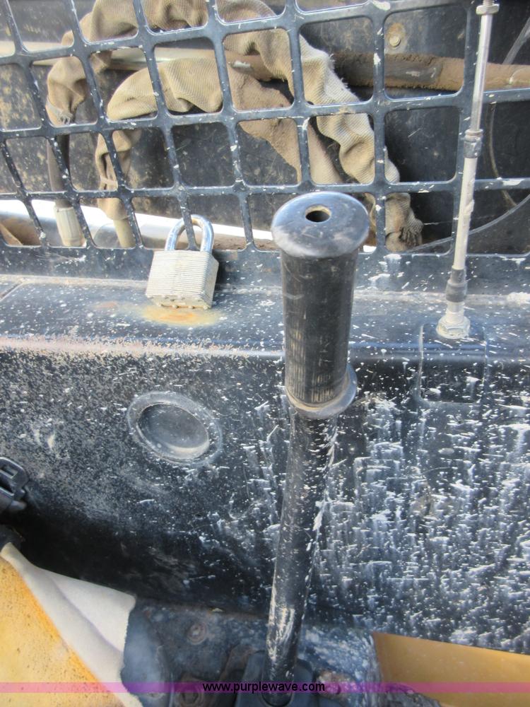 image for item I1894 1999 New Holland LX885 Super Boom skid steer