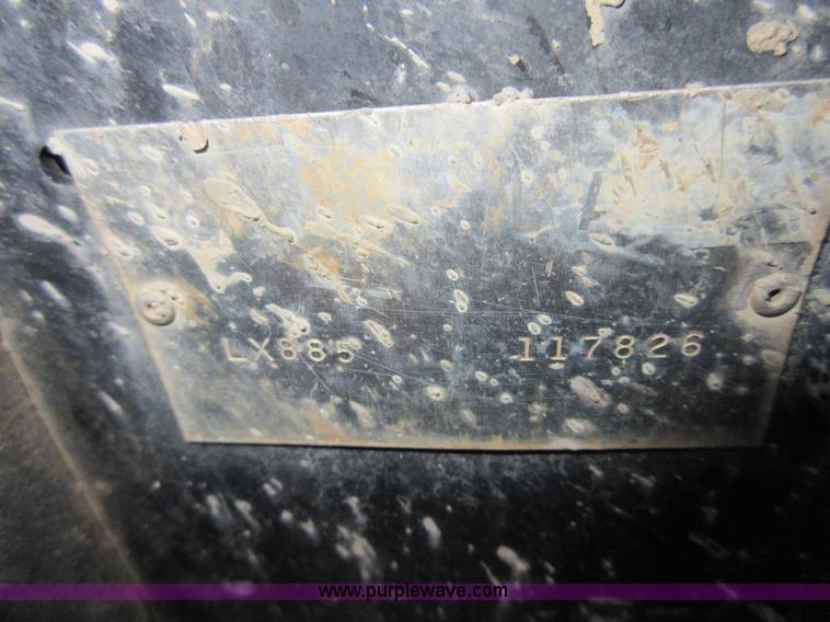 image for item I1894 1999 New Holland LX885 Super Boom skid steer