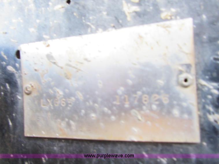 image for item I1894 1999 New Holland LX885 Super Boom skid steer