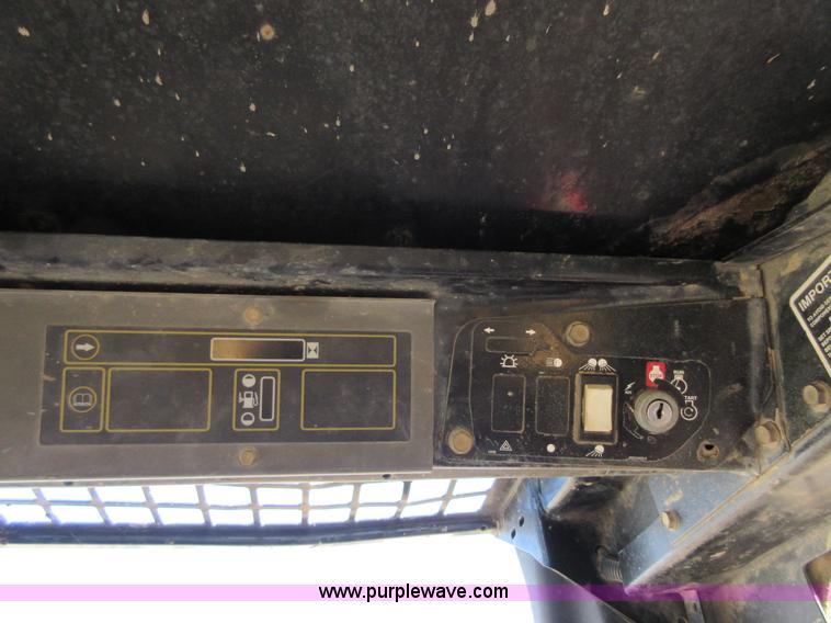 image for item I1894 1999 New Holland LX885 Super Boom skid steer