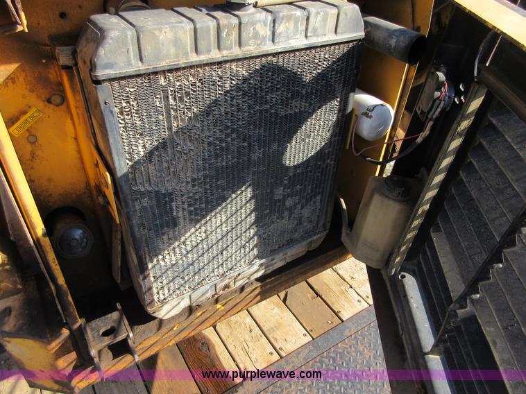 image for item I1894 1999 New Holland LX885 Super Boom skid steer