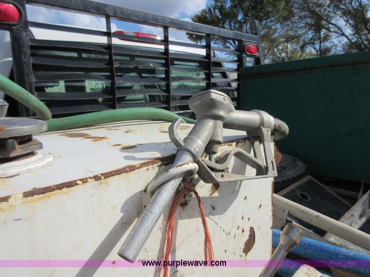 image for item I1896 2009 Chevrolet Silverado 3500 Crew Cab flatbed pickup truck