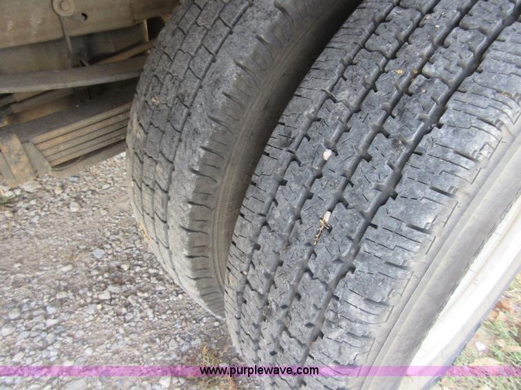 image for item I1896 2009 Chevrolet Silverado 3500 Crew Cab flatbed pickup truck