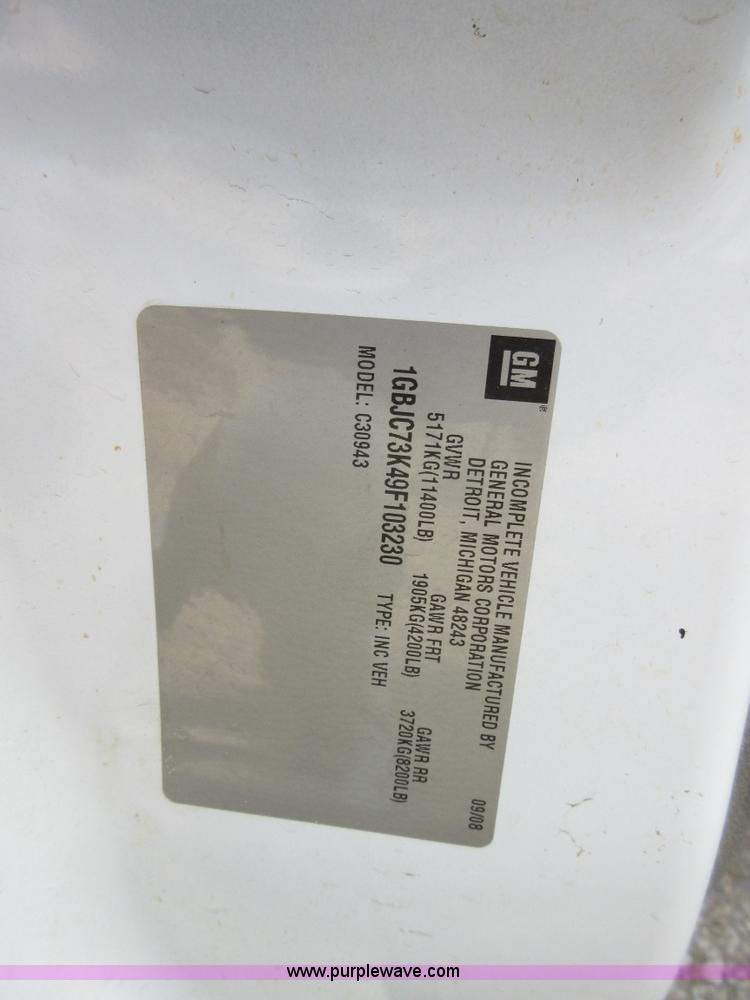 image for item I1896 2009 Chevrolet Silverado 3500 Crew Cab flatbed pickup truck