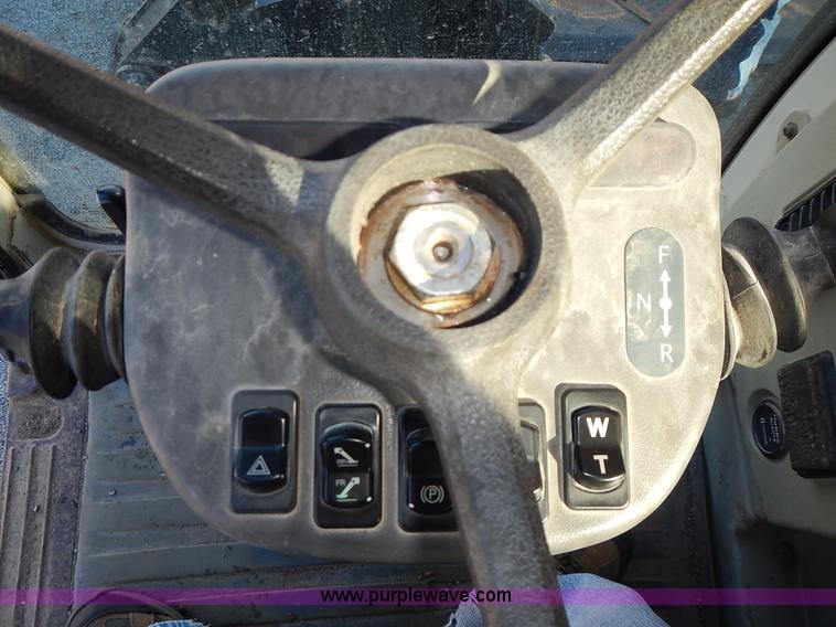 image for item L3524 2004 Hyundai Robex 200 W-7 excavator