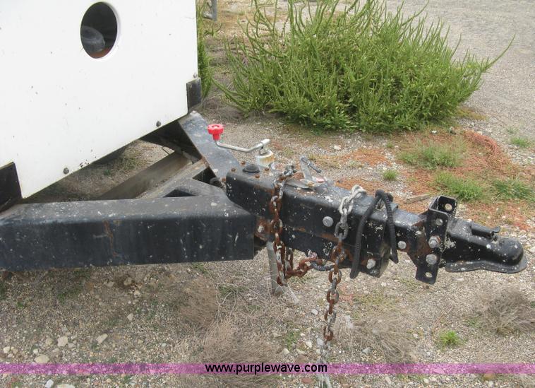 image for item L6376 Multiquip DCA-70SS1U Whisperwatt 70 generator