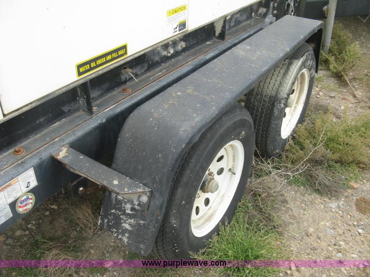 image for item L6376 Multiquip DCA-70SS1U Whisperwatt 70 generator