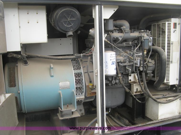 image for item L6377 Multiquip DCA-70SS1U Whisperwatt 70 generator