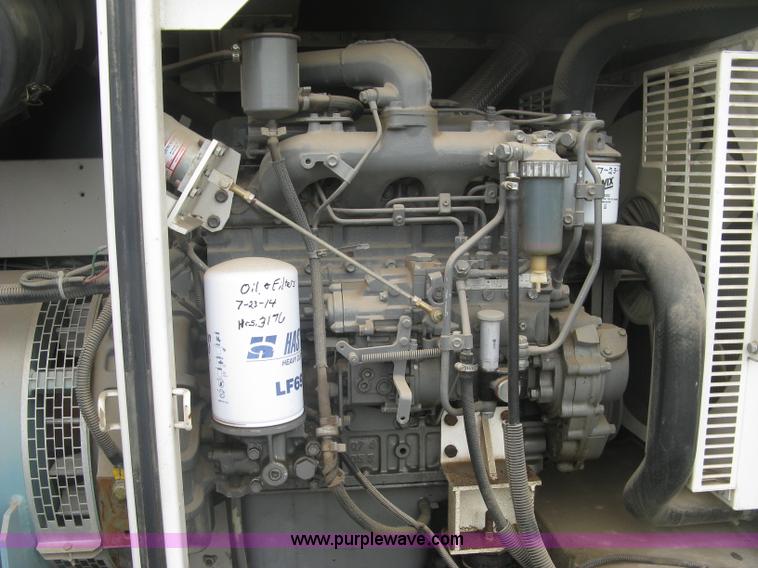 image for item L6377 Multiquip DCA-70SS1U Whisperwatt 70 generator