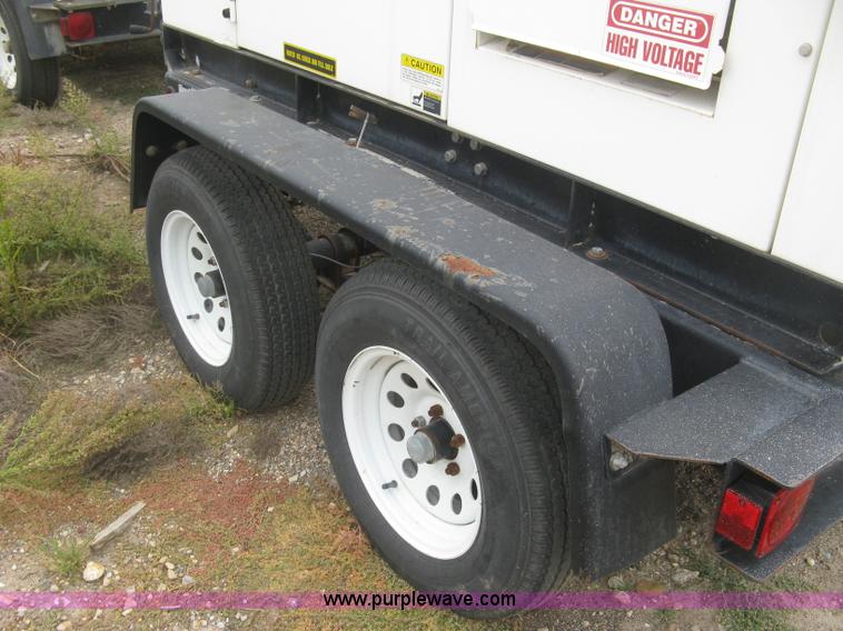 image for item L6377 Multiquip DCA-70SS1U Whisperwatt 70 generator