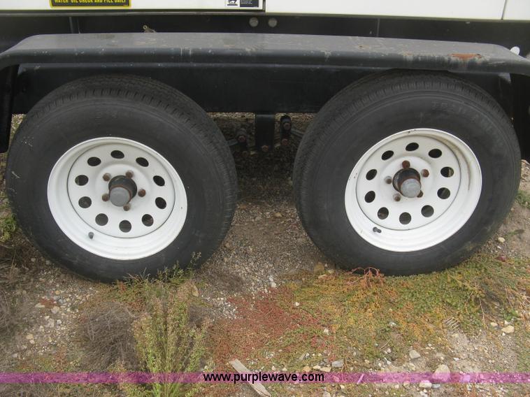 image for item L6377 Multiquip DCA-70SS1U Whisperwatt 70 generator