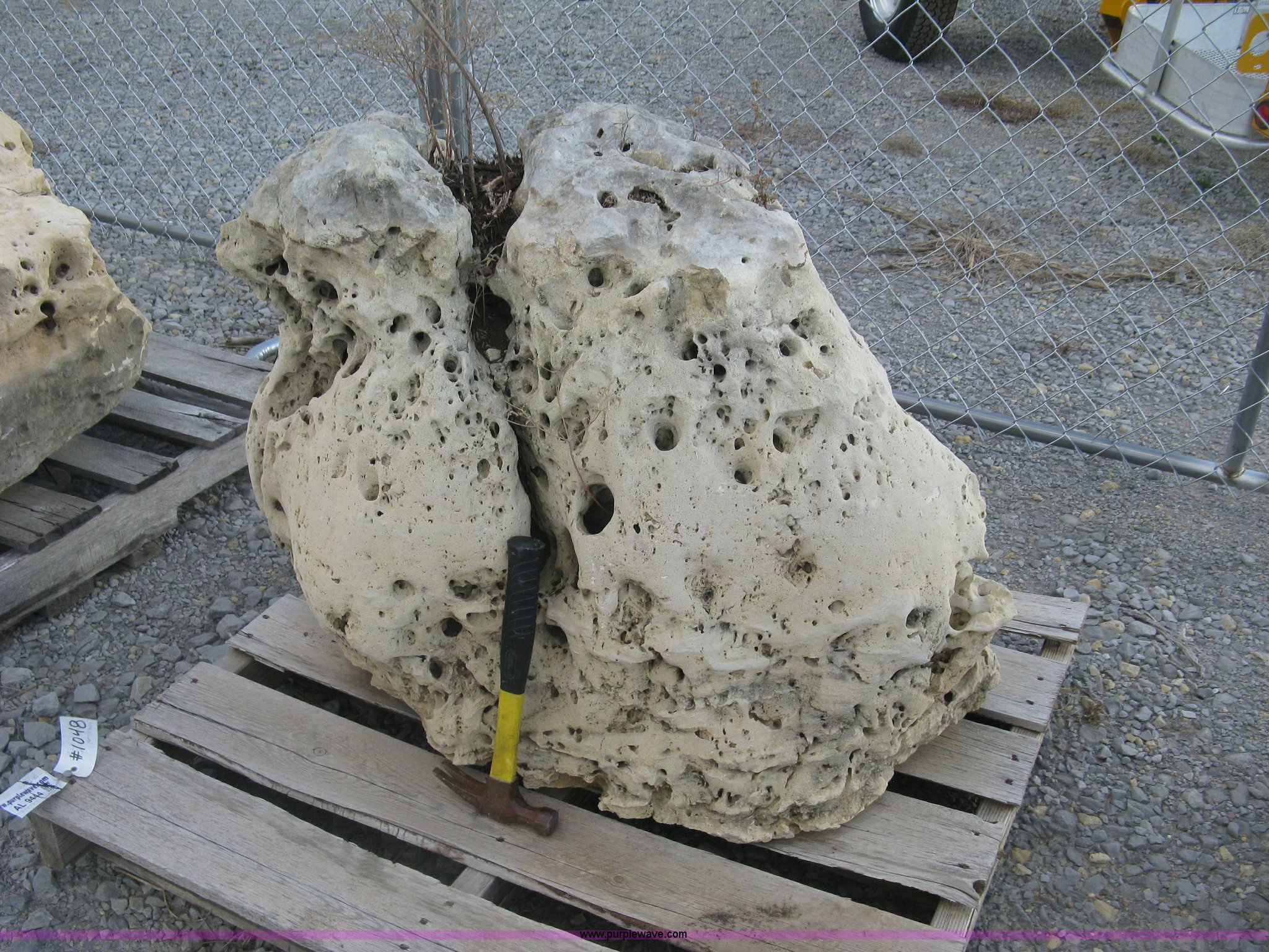 Holey limestone boulder in Wichita, KS | Item AL9444 sold | Purple Wave