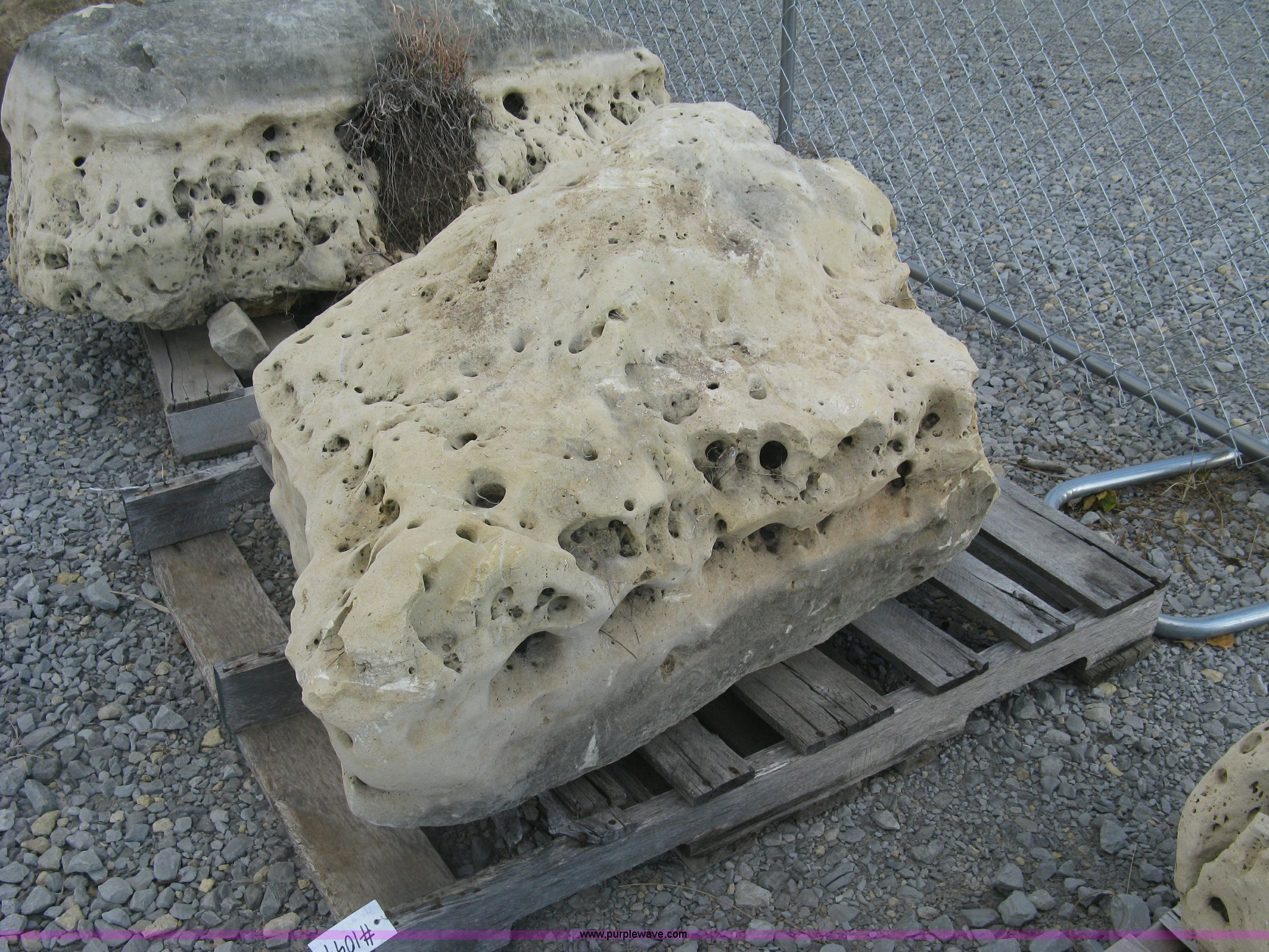 Holey limestone boulder in Wichita, KS | Item AL9445 sold | Purple Wave
