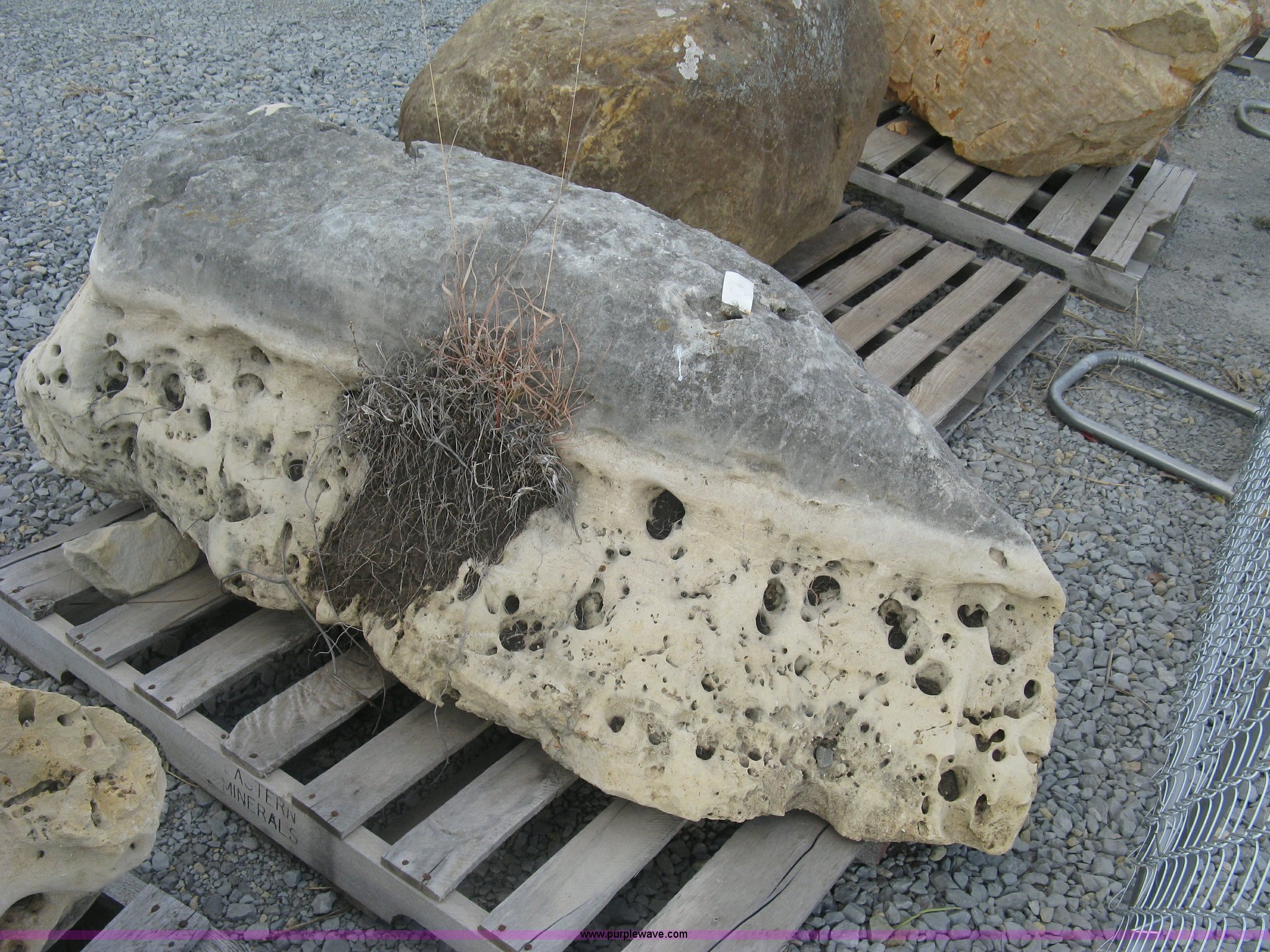 Holey limestone boulder in Wichita, KS | Item AL9446 sold | Purple Wave