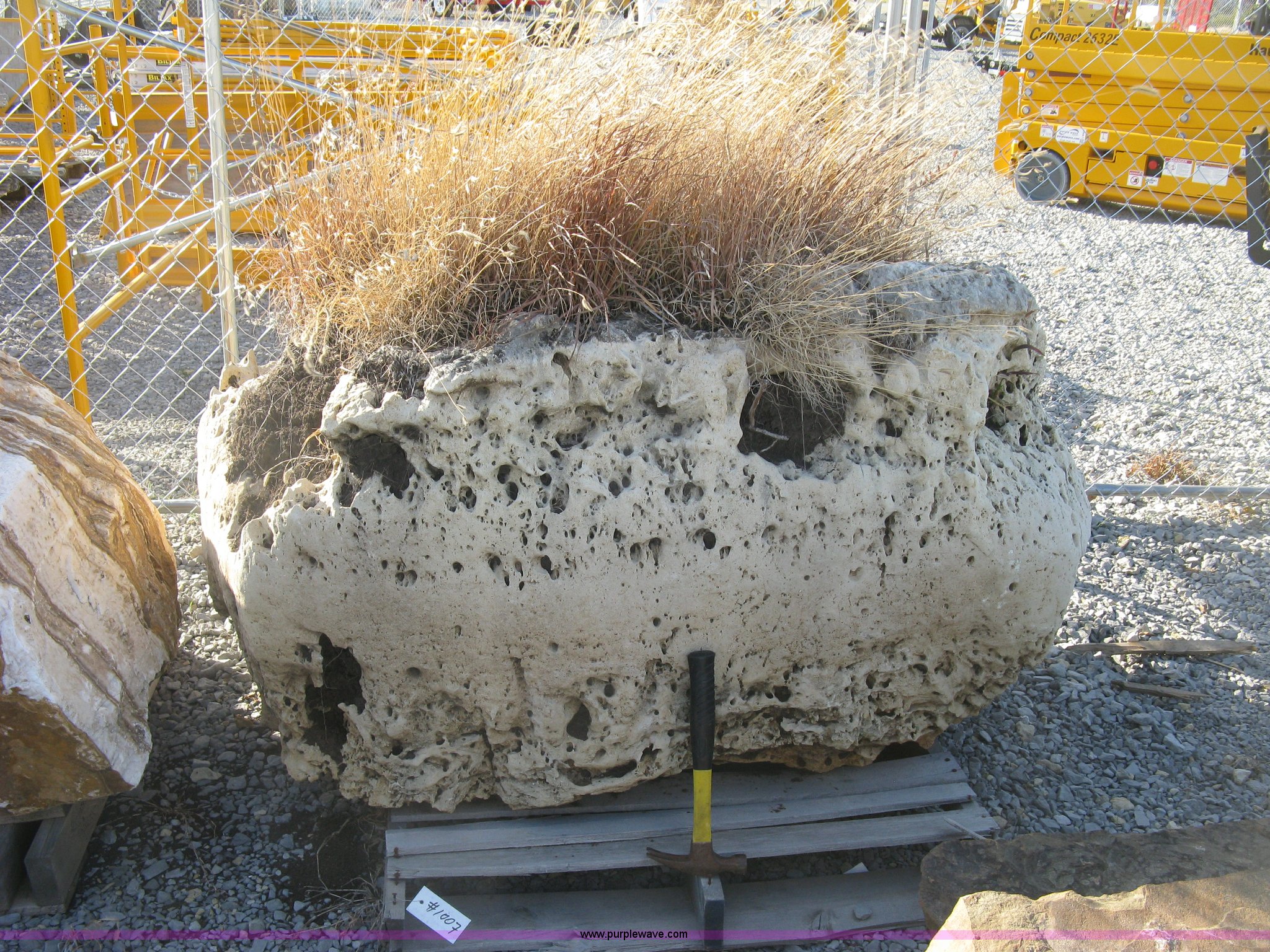 Holey limestone boulder in Wichita, KS | Item AL9485 sold | Purple Wave