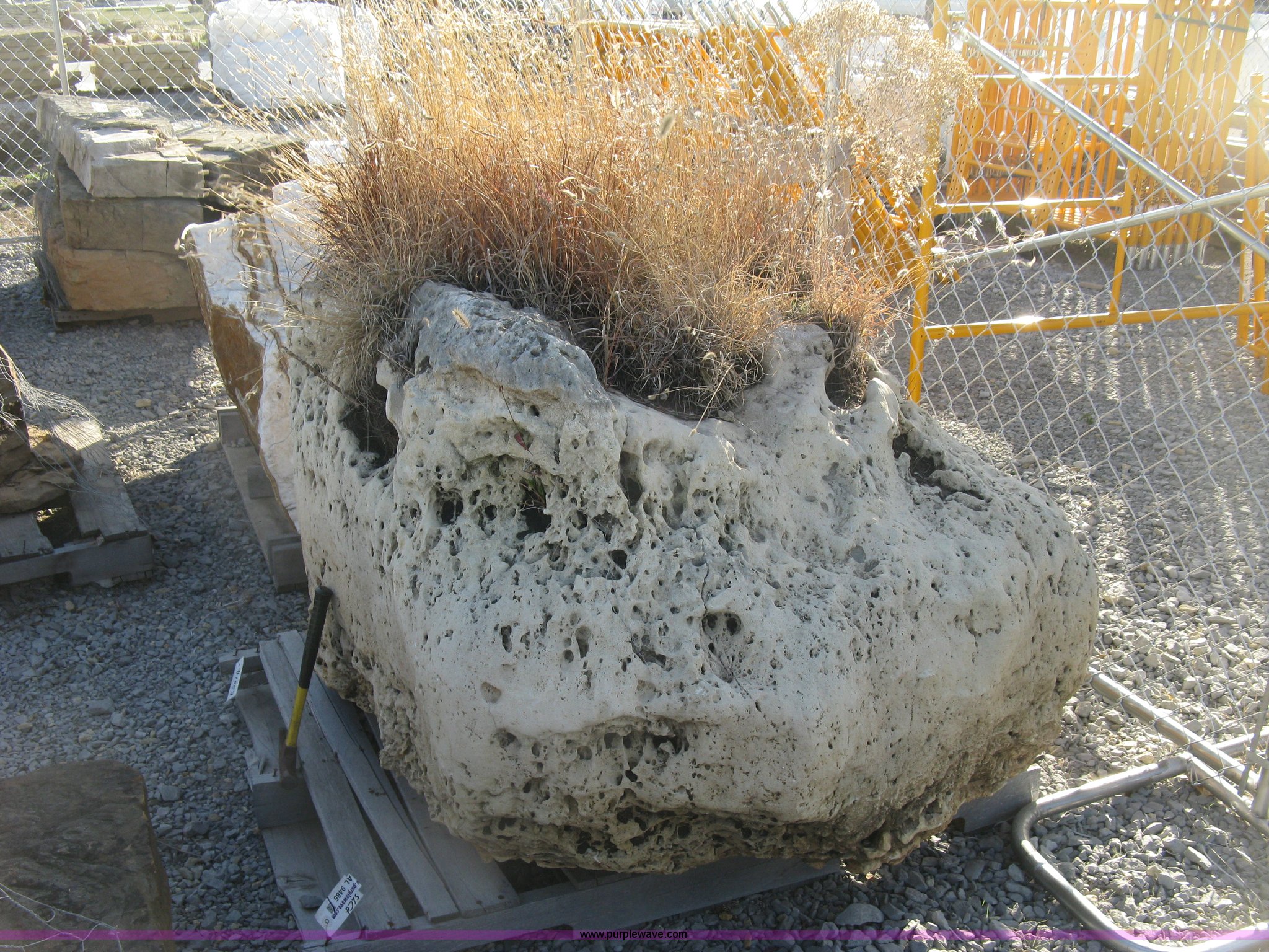 Holey limestone boulder in Wichita, KS | Item AL9485 sold | Purple Wave