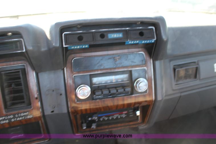 image for item J7499 1984 Ford F350 flatbed pickup truck