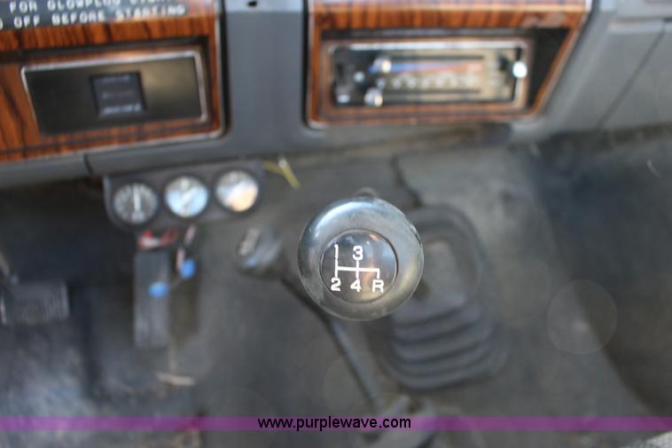 image for item J7499 1984 Ford F350 flatbed pickup truck