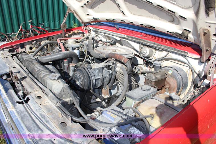 image for item J7499 1984 Ford F350 flatbed pickup truck