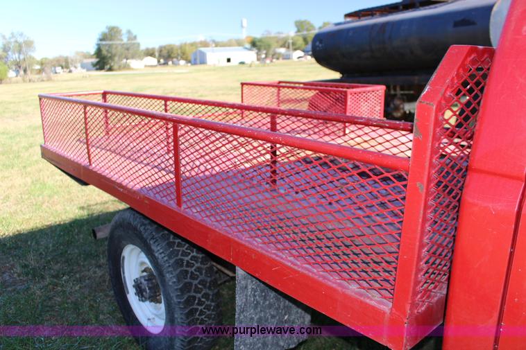 image for item J7499 1984 Ford F350 flatbed pickup truck