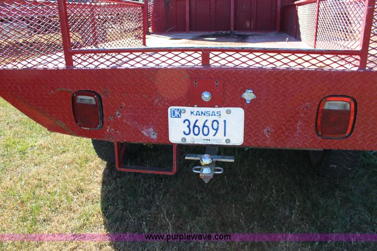 image for item J7499 1984 Ford F350 flatbed pickup truck