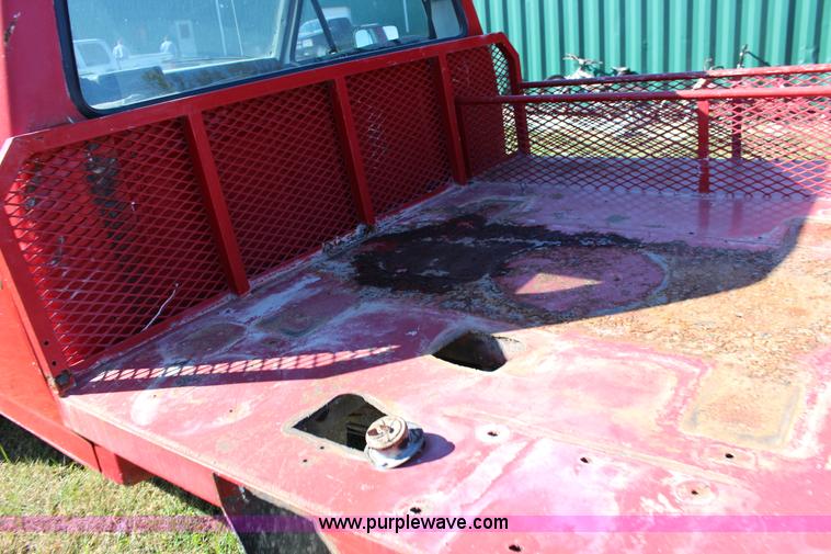 image for item J7499 1984 Ford F350 flatbed pickup truck