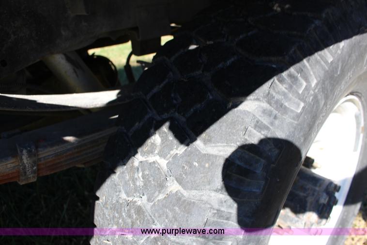 image for item J7499 1984 Ford F350 flatbed pickup truck