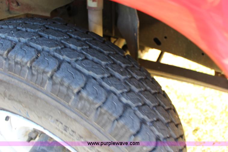 image for item J7499 1984 Ford F350 flatbed pickup truck