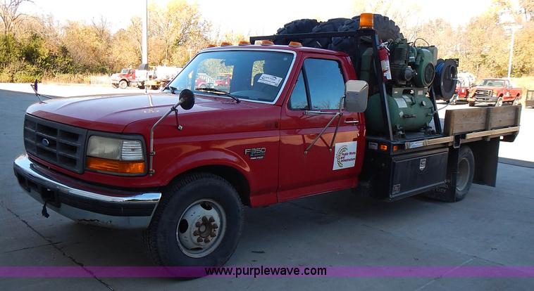 image for item L3511 1997 Ford F350 XL flatbed pickup truck with crane