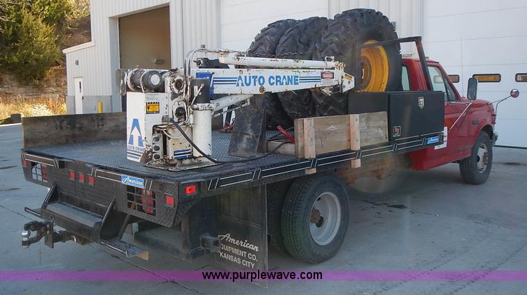 image for item L3511 1997 Ford F350 XL flatbed pickup truck with crane