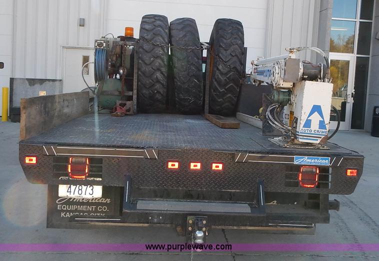 image for item L3511 1997 Ford F350 XL flatbed pickup truck with crane